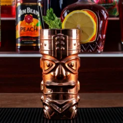 Hot Sale 😉 BarMan BarConic® Metal Plated Tiki Glass - 15 Ounce - (Color Options) 🤩 -Barman Sales Store barconic tiki glass gold scene1 700x700
